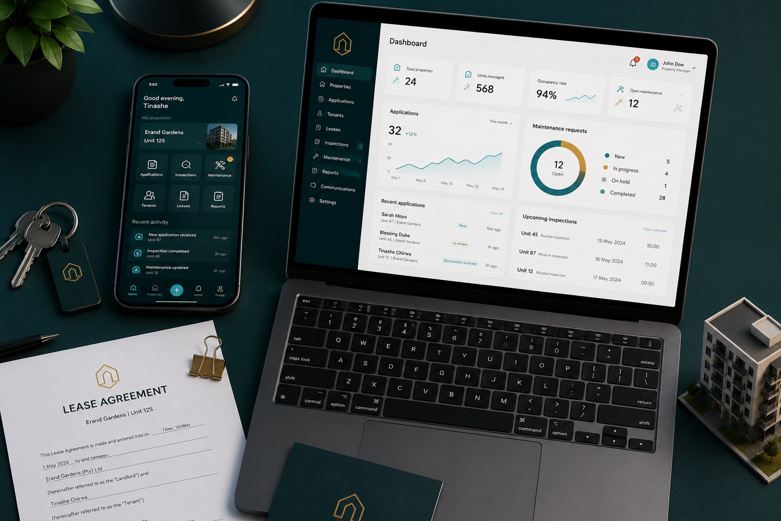 The PropBoard office dashboard on a laptop and the tenant app on a phone, with keys and a lease agreement